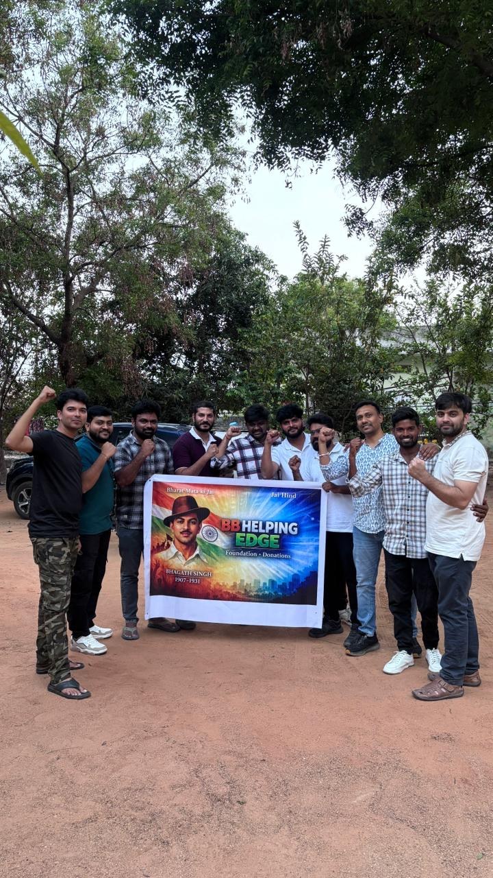 BB Helping Edge team holding their banner during the initiative
